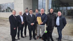 <p>Members of Ballyfeeney Action Group and Ballyfeeney NS representatives handing the objections into the council earlier this year. </p>
