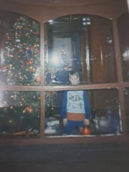Alan Beirne back in 1990 delighted with his Christmas tree.