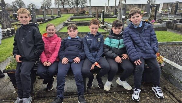 The sixth class pupils on a visit to Lisacul Graveyard. 