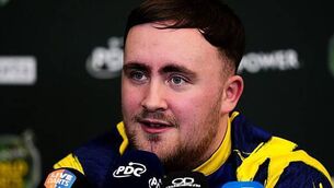 Luke Littler shrugs off boos to beat Rob Cross in last 16 at World Championship Luke Littler shrugs off boos to beat Rob Cross in last 16 at World Championship