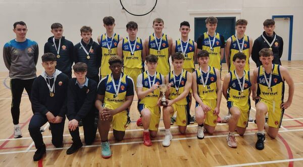 The Castlerea Community School's senior boys' basketball team defeated Sligo Grammar 49-40 to win back-to-back regional titles at The Hub prior to Christmas. The team members are pictured here with their coach Tomas Callaghan. The Castlerea Community School's senior boys' basketball team defeated Sligo Grammar 49-40 to win back-to-back regional titles at The Hub prior to Christmas. The team members are pictured here with their coach Tomas Callaghan.