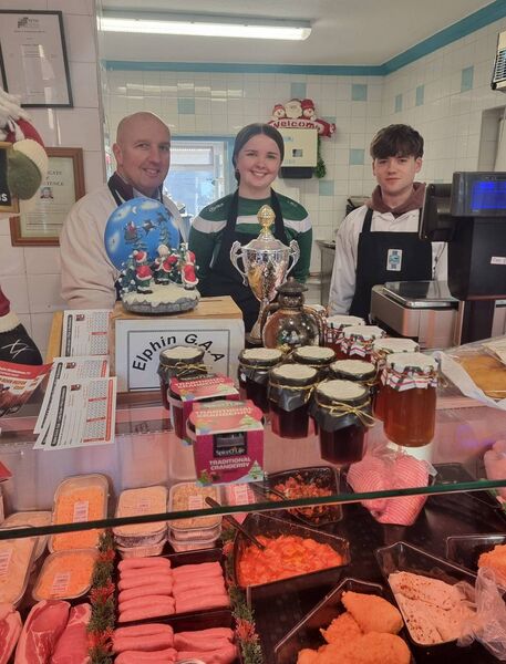 Ronan Gavigan, Morris Meats with Eleanor and Jacob on a busy Christmas Eve, still smiling. Ronan Gavigan, Morris Meats with Eleanor and Jacob on a busy Christmas Eve, still smiling.