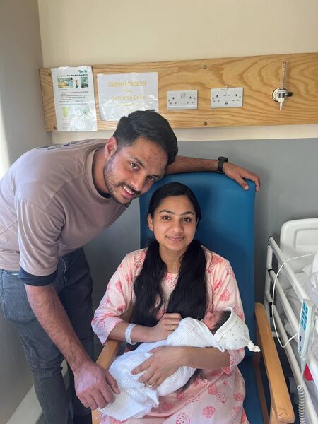 Baby Aqsa Afsal with proud parents Farsana and Samad.