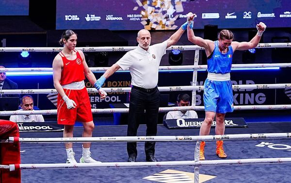 Ireland's Aoife O'Rourke (right) celebrates after beating Turkey's Busra Isildar in the women's 75kg final at the World Boxing Championships. Photograph: Peter Byrne/PA 