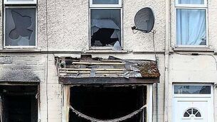 Bodies of boy and man removed from separate Dublin homes