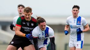 <p>Mark Daly tackles Padraig O'Hora during the recent Connacht club semi-final between St. Brigid's and Ballina Stephenites at King and Moffatt Dr. Hyde Park. Daly will be available for this Sunday's big game against Dingle, despite picking up an injury in the All-Ireland semi-final. Picture: INPHO/James Lawlor</p>