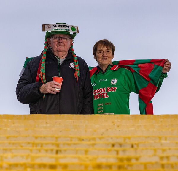 SHEER CLASS: St. Brigid's supporters James Halpin and Trisha Loftus ahead of the the club's Connacht final success against Moycullen at the end of November, one of the many great days the current team have given supporters. Picture: INPHO/Dan Clohessy