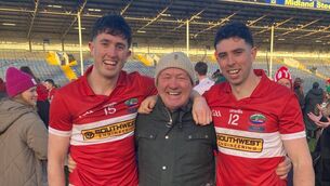 <p>Tom Óg O'Brien with Niall and Dylan Geaney following Dingle's first Kerry SFC success in 77 years. </p>