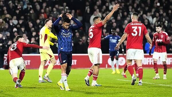 Arsenal miss chance to pull further clear at top as stubborn Forest claim point