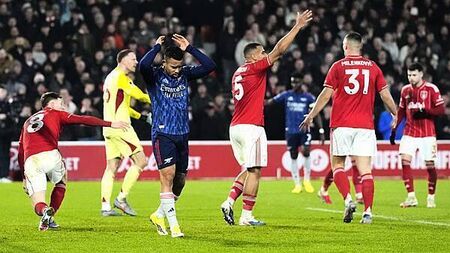 Arsenal miss chance to pull further clear at top as stubborn Forest claim point