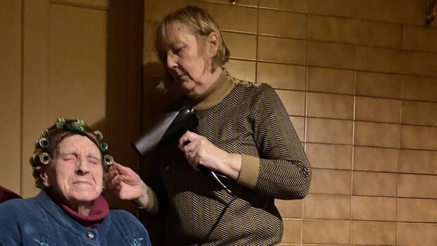 <p>Kathy Raftery's 'Fireside Beauty Parlour' is on exhibit at the National Gallery.</p>