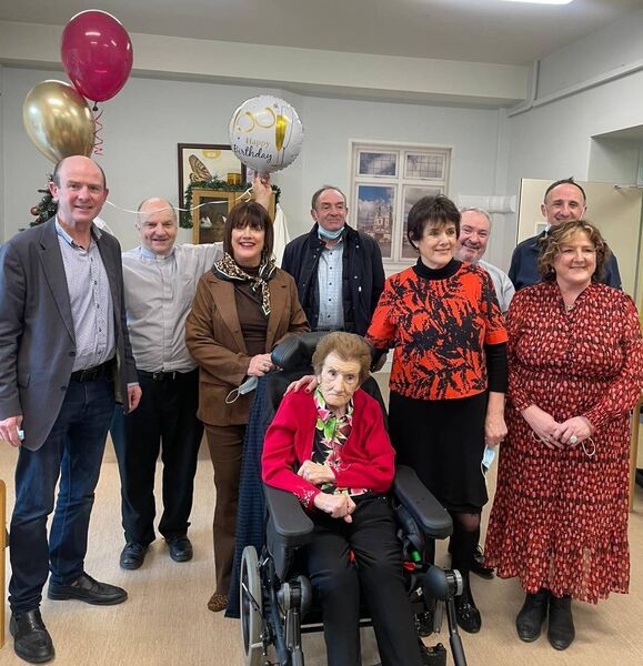 Mary Bannon celebrating her 100th birthday with Vincent, Fr Charlie Healy, Liz, Joe, Maire, Fr. John Deignan, George and Edel. Mary Bannon celebrating her 100th birthday with Vincent, Fr Charlie Healy, Liz, Joe, Maire, Fr. John Deignan, George and Edel.
