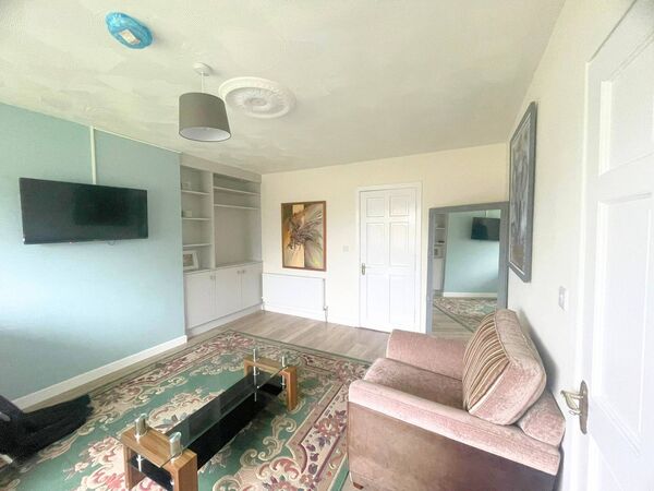 One of the living rooms in the property. One of the living rooms in the property.