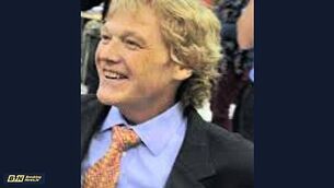 Swimming coach who filmed girls changing jailed for three years