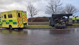 <p>The overturned tractor at the main Monksland roundabout.</p> <p>The overturned tractor at the main Monksland roundabout.</p>