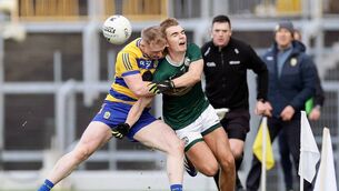 <p>TAKE THAT: Dylan Casey is tackled by Paul Carey during Sunday's Division One League game between Kerry and Roscommon at Fitzgerald Stadium, Killarney. Picture: INPHO/Laszlo Geczo</p>