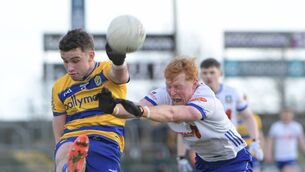 <p>Roscommon midfielder, Conor Ryan, gets a shot away towards goal under pressure from Monaghan's Ryan O'Toole during Sunday afternoon's Division One Football League game at King and Moffatt Dr. Hyde Park. Picture: INPHO/Andrew Paton</p>