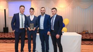 <p>Special guests Niall Daly, Donie Smith and Ciaráin Murtagh make a presentation to Roscommon minor football captain, Dara Curran, to recognise his selection on the 2025 Electric Ireland Minor Football Team of the Year award in the Abbey Hotel. Picture: Bernie O'Farrell</p>