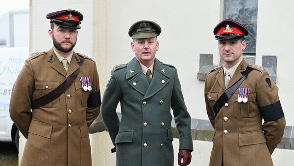 Capt. David Jones, Lt. Niall Verling, Defence Forces and Capt. Tom Vincent in Ballinameen for the funeral of Captain Gilbert Muldowney. Pic: Gerard O'Loughlin