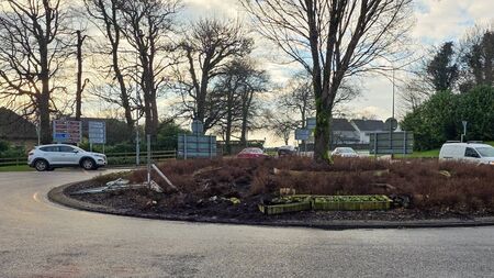 Man arrested following roundabout crash