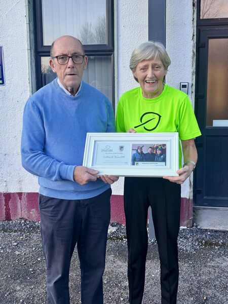 Caroline Rushe from Parkinson's Ireland, making a presentation to Brian Stenson, a token of appreciation, following the Castlerea St. Kevin’s fundraising walk in aid of Parkinson’s Ireland. Caroline Rushe from Parkinson's Ireland, making a presentation to Brian Stenson, a token of appreciation, following the Castlerea St. Kevin’s fundraising walk in aid of Parkinson’s Ireland.