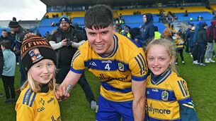 <p>Roscommon defender Niall Higgins signs autographs for young supporters Hannah Towey and Holly McDermott in the aftermath of his side's famous victory against Armagh at King and Moffatt Dr. Hyde Park. Picture: Gerard O'Loughlin</p> <p>Roscommon defender Niall Higgins signs autographs for young supporters Hannah Towey and Holly McDermott in the aftermath of his side's famous victory against Armagh at King and Moffatt Dr. Hyde Park. Picture: Gerard O'Loughlin</p>