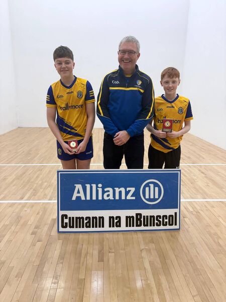 U-13 boys’ doubles winners, Seamie McPhillips and Calum Keane, St. Coman’s Wood, with Noel Dervan, Cumann na mBunscol, following the recent handball finals at St. Coman’s Handball Club. U-13 boys’ doubles winners, Seamie McPhillips and Calum Keane, St. Coman’s Wood, with Noel Dervan, Cumann na mBunscol, following the recent handball finals at St. Coman’s Handball Club.