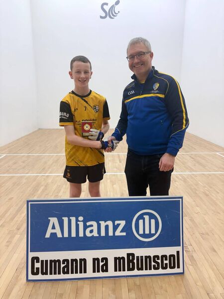 U-13 boys’ singles winner, Patrick Farrell, Roxboro NS, with Noel Dervan, Cumann na mBunscol, following the recent handball finals at St. Coman’s Handball Club. U-13 boys’ singles winner, Patrick Farrell, Roxboro NS, with Noel Dervan, Cumann na mBunscol, following the recent handball finals at St. Coman’s Handball Club.