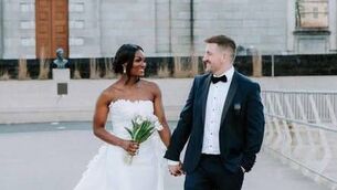 <p>Former Clann na nGael player Niall McManus with his bride, Ebi Brambaifa McManus, on their wedding day. Picture: Clann na nGael</p>