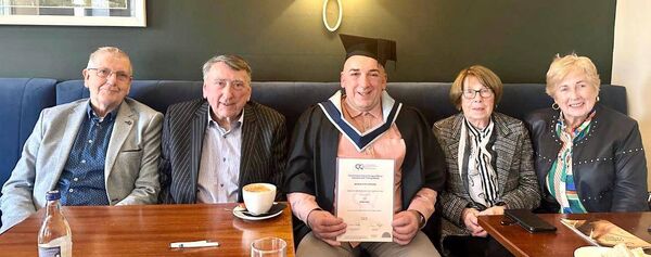Donal Hanly on his graduation day with his degree in Counselling and Psychotherapy with Addiction Studies. On either side of him are his parents, Percy and Maureen Hanly. Also in the picture is his aunt Eileen and her husband, Canice Smyth.