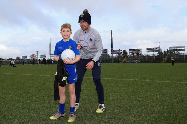 Jamie Killeen with Sean Kelly at a Meet and Greet with the Roscommon senior footballers at King and Moffatt Dr. Hyde Park. Pic: Bernie O'Farrell Jamie Killeen with Sean Kelly at a Meet and Greet with the Roscommon senior footballers at King and Moffatt Dr. Hyde Park. Pic: Bernie O'Farrell
