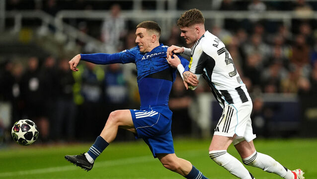 <p>Newcastle United's Alex Murphy (right) battling for the ball with Qarabag's Joni Montiel during the UEFA Champions League game at St James' Park, Newcastle. Pic: Martin Rickett/PA Wire.</p>