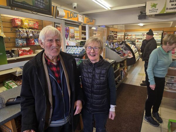 Loyal custom: Another faithful customer Sean Grady with Imelda Towey.