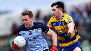<p>Dublin's Paddy Small gathers possession ahead of Roscommon's Senan Lambe during Sunday's game at King and Moffatt Dr. Hyde Park. Picture: INPHO/Tom O’Hanlon</p> <p>Dublin's Paddy Small gathers possession ahead of Roscommon's Senan Lambe during Sunday's game at King and Moffatt Dr. Hyde Park. Picture: INPHO/Tom O’Hanlon</p>