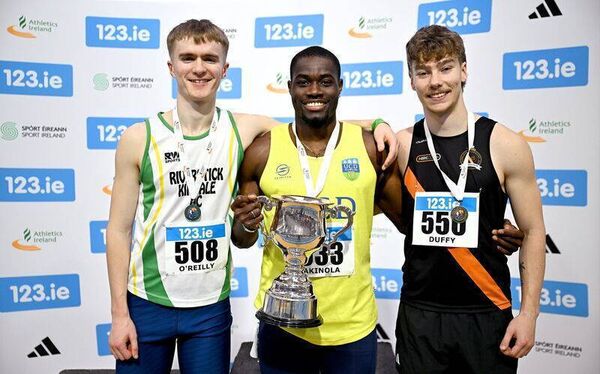 1 March 2026; Men's 60m medallists, Bori Akinola of UCD AC, Dublin, centre, gold, Max O'Reilly of Riverstick/Kinsale AC, Cork, left, silver, and Craig Duffy of Clonliffe Harriers AC, Dublin, right, bronze, during day two of the 123.ie National Senior Indoor Championships at the National Indoor Arena on the Sport Ireland Campus in Dublin. Photo by Sam Barnes/Sportsfile 