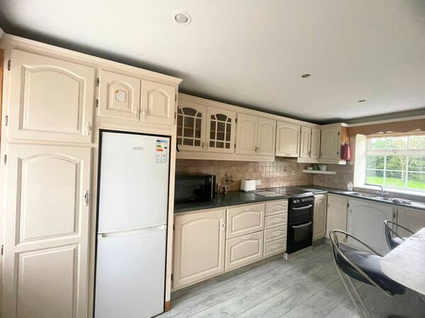 The kitchen is well laid out with plenty of storage. The kitchen is well laid out with plenty of storage.