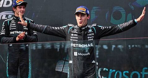 George Russell enjoys ‘hell of a fight’ to win season-opening race in Australia