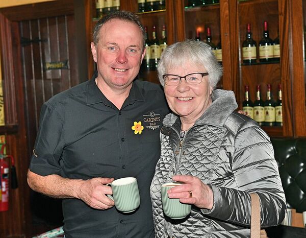 Paul Carthy and Chris Shelley at a coffee morning in JJ Harlow's, Roscommon ahead of Daffodil Day in aid of the Irish Cancer Society. Pic: Gerard O'Loughlin 