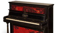 Piano John Lennon used to write Beatles songs fetches record amount at auction