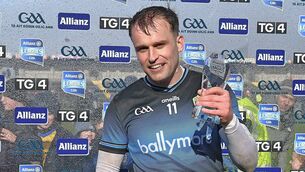 <p>Enda Smith with his TG4 Player of the Match award following his six-point contribution against Donegal. </p>