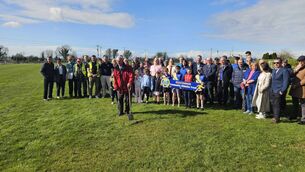 <p>Anthony Doolan, pictured alongside members of the local community and surrounding areas ahead of the sod being turned on the new state of the art running track in Lisnamult.</p>