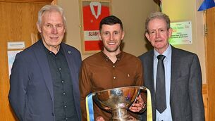 <p>THREE ROSCOMMON LEGENDS: Former Roscommon senior footballer, Ciaráin Murtagh, with Pat Lindsay and Danny Murray, and the Nestor Cup, in Ballyleague on Saturday evening. Picture: Gerard O'Loughlin</p>