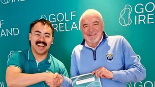 <p>Alex Lai, Inclusion Co-ordinator Golf Ireland, with Martin Crinigan, Strokestown Golf Club, after Martin was shortlisted for the Golf Ireland Volunteer Awards in the Inclusion and Disability category. </p>