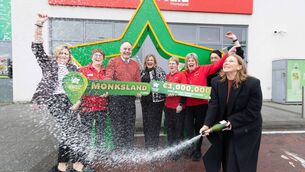 <p>Staff at Smyth's Supervalu in Monksland celebrating after it was revealed that the store sold Monday's winning Daily Million ticket worth €1m. Picture: Eamon Ward</p>