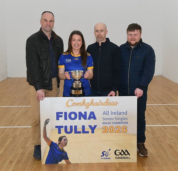 Fiona Tully pictured with Aengus Cunningham, Oisín Naughton and Cathal O’Connor on her triumphant return to St. Coman's Handball Club as All-Ireland Senior Singles 40 x 20 champion recently. Picture: Gerard O'Loughlin