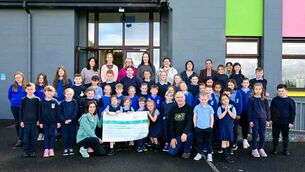 <p>Staff, parents and pupils of Tibohine NS present a cheque for €2,000 from the recent Tractors and Tea fundraiser to Children's Health Ireland representative Tim Dennehy. Pic: Breda Durr</p>