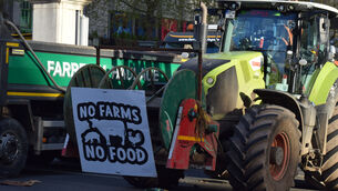 <p>Trucks and tractors on O'Connell Street in Dublin.</p>