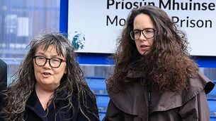 Families of Stardust victims take part in slow walk to Coroner's Court