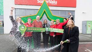 <p>Manager Tim Dolan and staff at Smyth’s Supervalu in Monksland celebrating last month after the store sold a winning Daily Million ticket worth €1m. Picture: Eamon Ward</p>