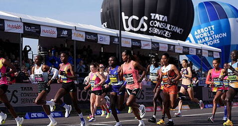 Tens of thousands pounding streets in record-breaking London Marathon